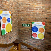 Modern acrylic reception sign welcoming visitors